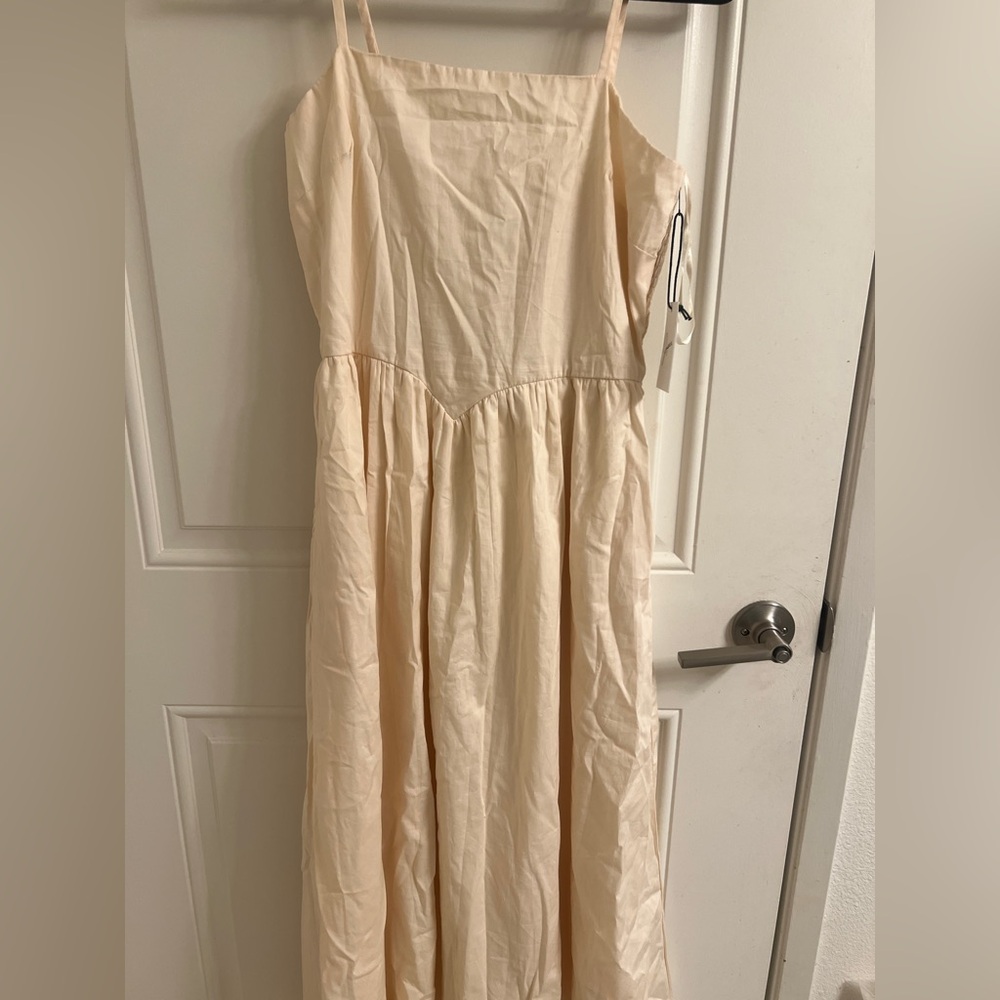 Elegant Cream Sleeveless Dress